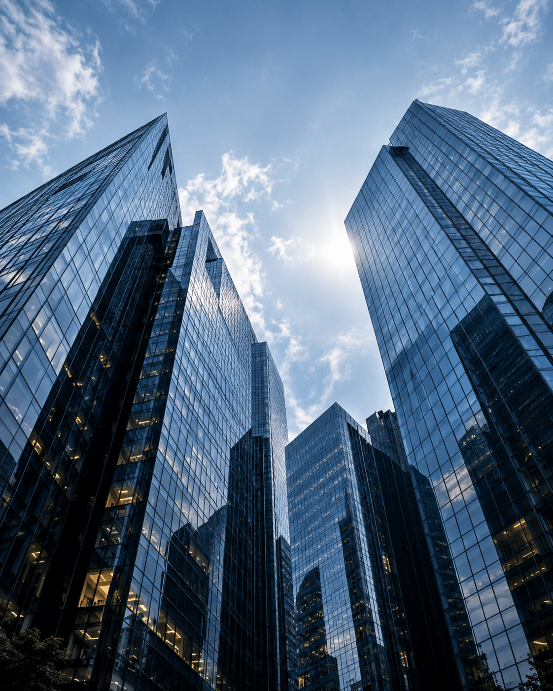 Glass office towers seen from below